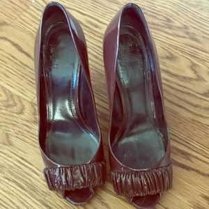 Burberry burgundy patent peep toe pumps